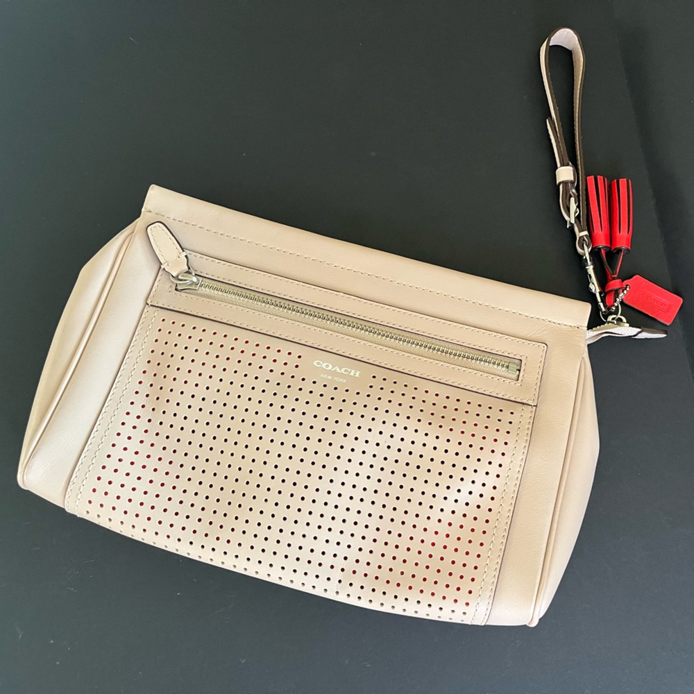 COACH nude perforated clutch